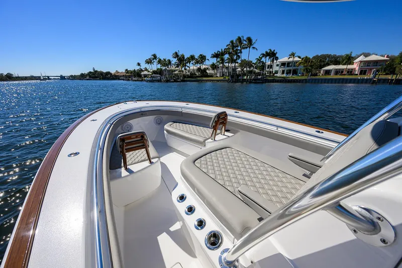 Slide: The Image of 2024 Valhalla Boatworks V-33 luxury boat interior with waterfront view. - 13