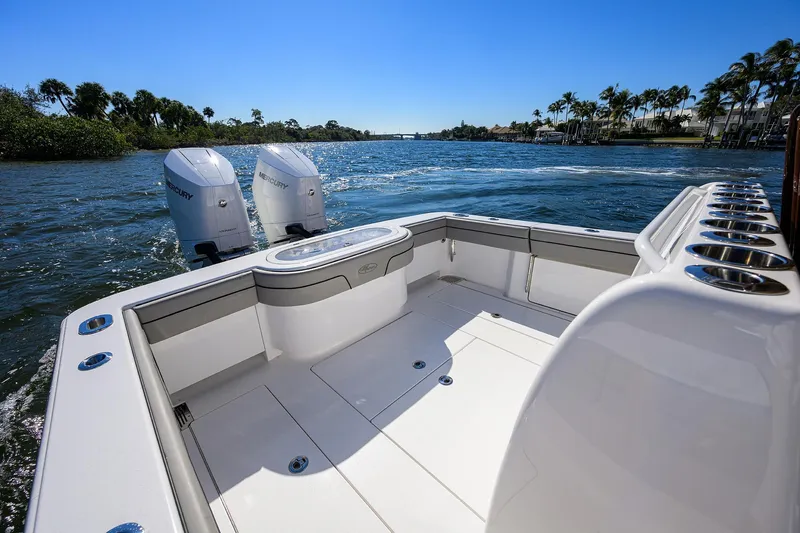 Slide: The Image of 2024 Valhalla Boatworks V-33 on water, featuring dual Mercury engines. - 22