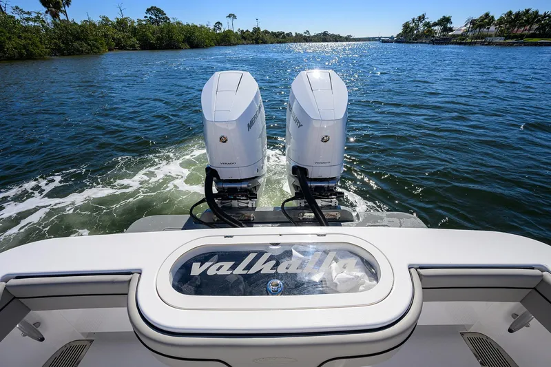 Slide: The Image of 2024 Valhalla Boatworks V-33 with dual Mercury engines cruising on a sunny day. - 38