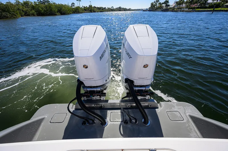 Slide: The Image of 2024 Valhalla Boatworks V-33 with twin Mercury outboard engines on water. - 39