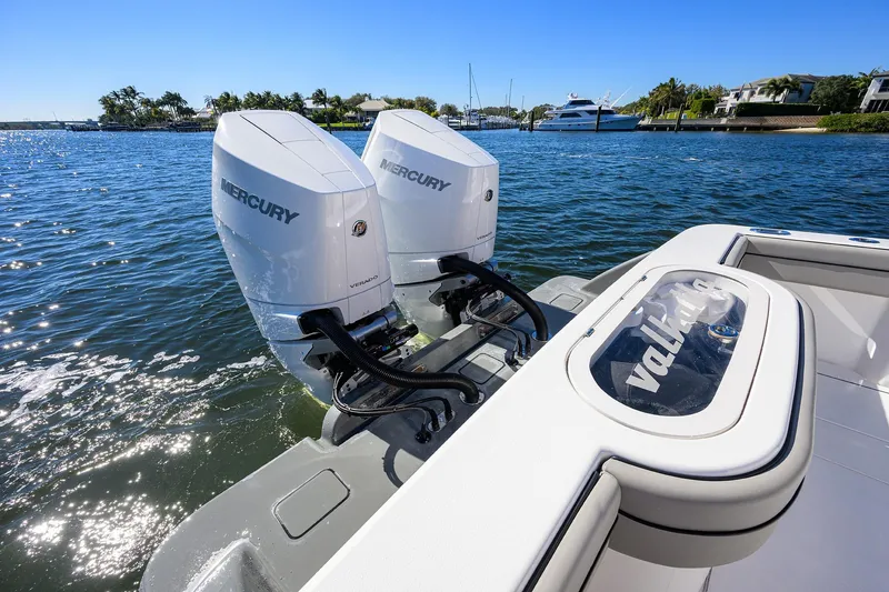 Slide: The Image of 2024 Valhalla V-33 boat with dual Mercury engines on a sunny day. - 40