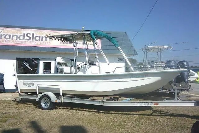 The Image of 2005 Sundance B22CX boat on trailer outside Grand Slam Boat Sales. - 1