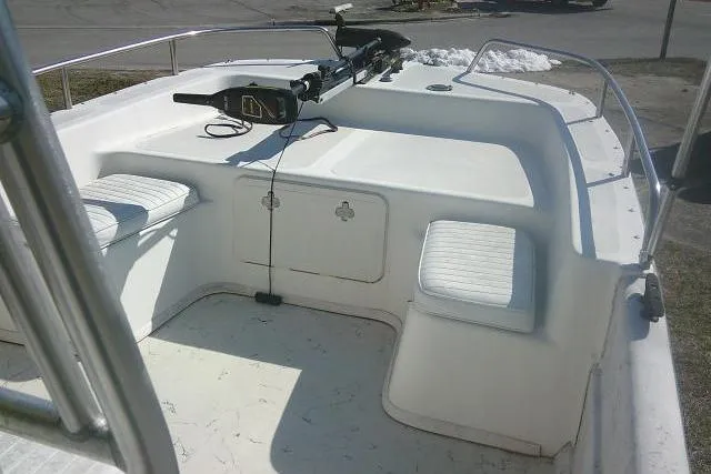 Slide: The Image of 2005 Sundance B22CX boat deck with seating and mounted equipment. - 13