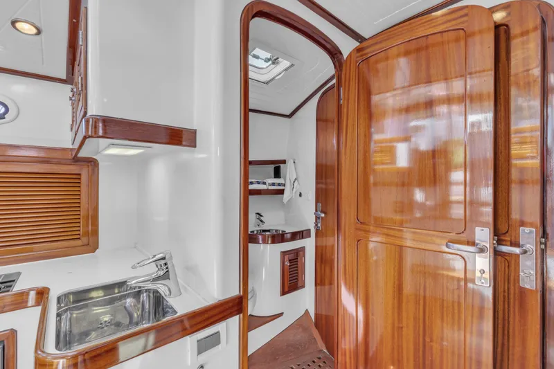 Slide: The Image of Luxurious interior of 2007 Gorbon Custom Downeast 40 yacht with polished wood finishes. - 28