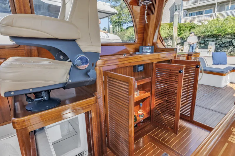 Slide: The Image of Luxurious interior of 2007 Gorbon Custom Downeast 40 yacht with wooden cabinetry and seating. - 42