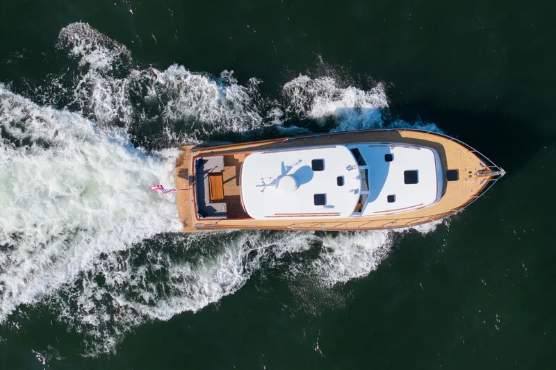 Slide: The Image of Aerial view of 2007 Gorbon Custom Downeast 40 yacht cruising on open water. - 7