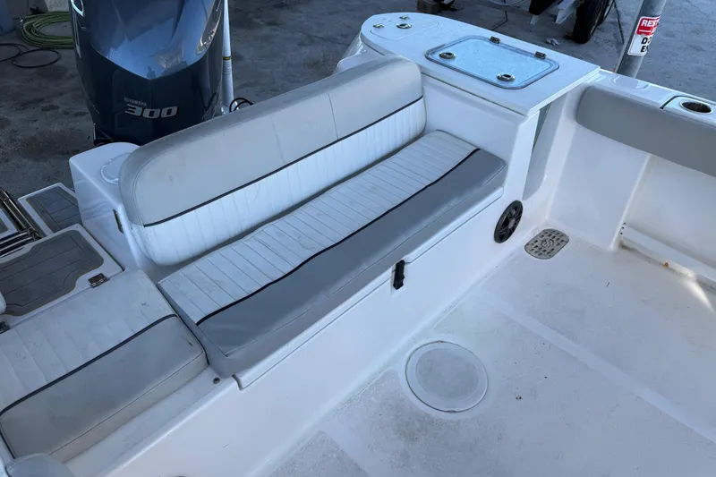 Slide: The Image of 2021 Sea Fox 248 Commander boat interior with seating and Yamaha 300 engine. - 11