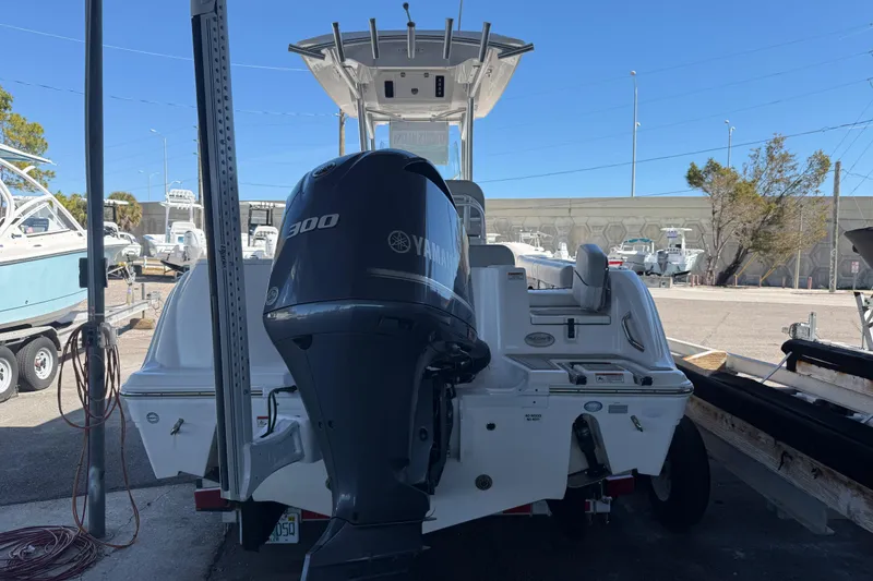 Slide: The Image of 2021 Sea Fox 248 Commander boat with Yamaha 300 engine in a marina. - 4