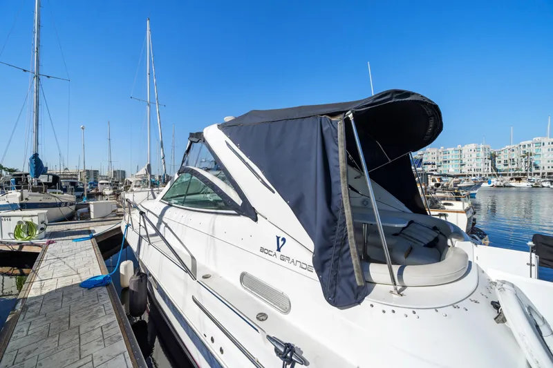 Slide: The Image of 2005 Doral 360se yacht docked at marina under clear blue sky. - 10