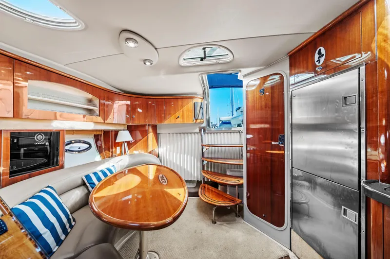 Slide: The Image of Luxurious interior of 2005 Doral 360se yacht with polished wood and modern amenities. - 16