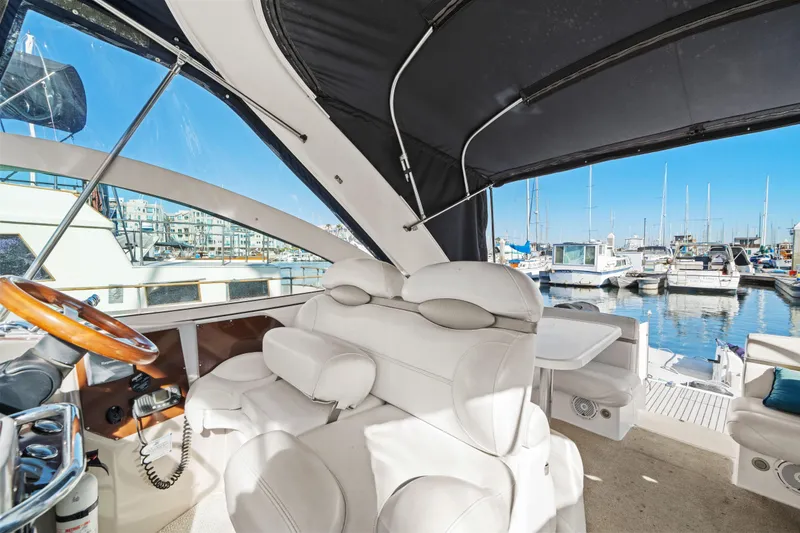 Slide: The Image of Interior of a 2005 Doral 360se yacht with marina view. - 21