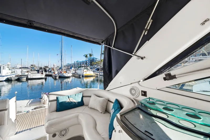 Slide: The Image of 2005 Doral 360se yacht interior with marina view, featuring comfortable seating and modern amenities. - 24