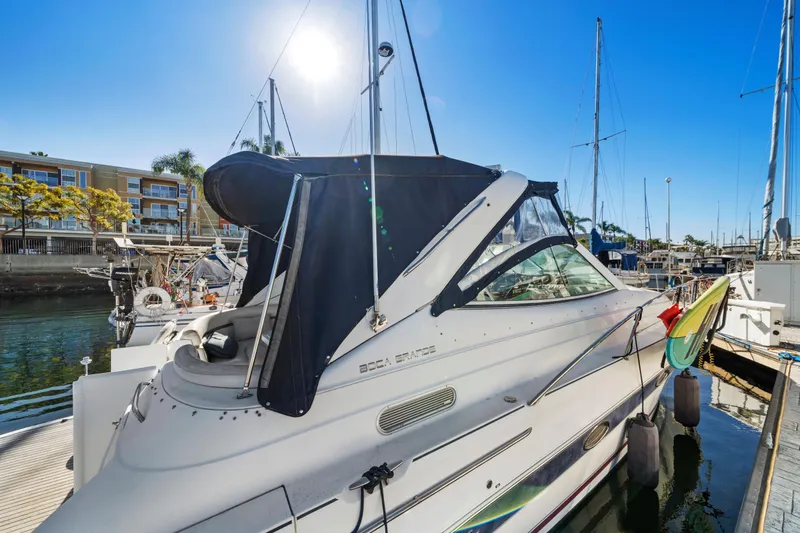 Slide: The Image of 2005 Doral 360se boat docked at marina under clear blue sky. - 8