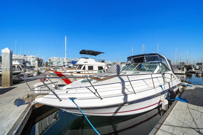 Slide: The Image of 2005 Doral 360se yacht docked at marina under clear blue sky. - 9