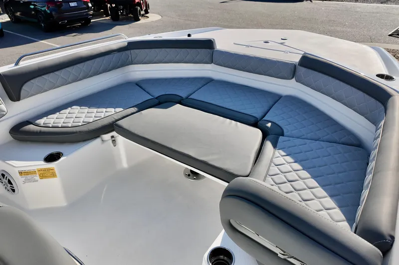 Slide: The Image of 2026 NauticStar 231 Hybrid boat interior with cushioned seating and modern design. - 15