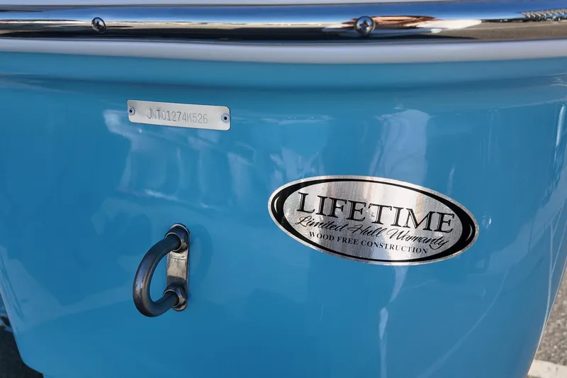 Slide: The Image of 2026 NauticStar 231 Hybrid boat with lifetime hull warranty badge. - 22