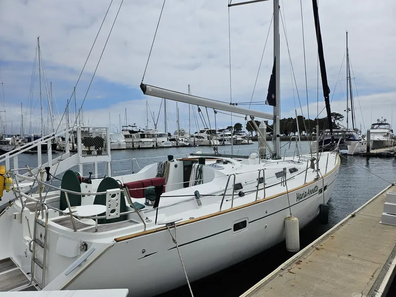 Slide: The Image of 2001 Beneteau Oceanis Clipper 473 sailboat docked at marina. - 0