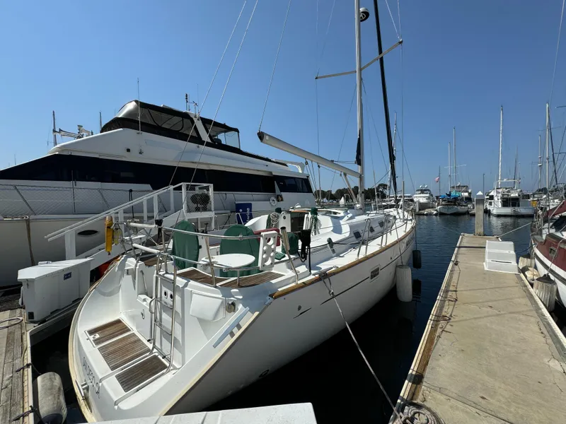 Slide: The Image of Beneteau Oceanis Clipper 473 yacht docked at marina, 2001 model, sunny day. - 3