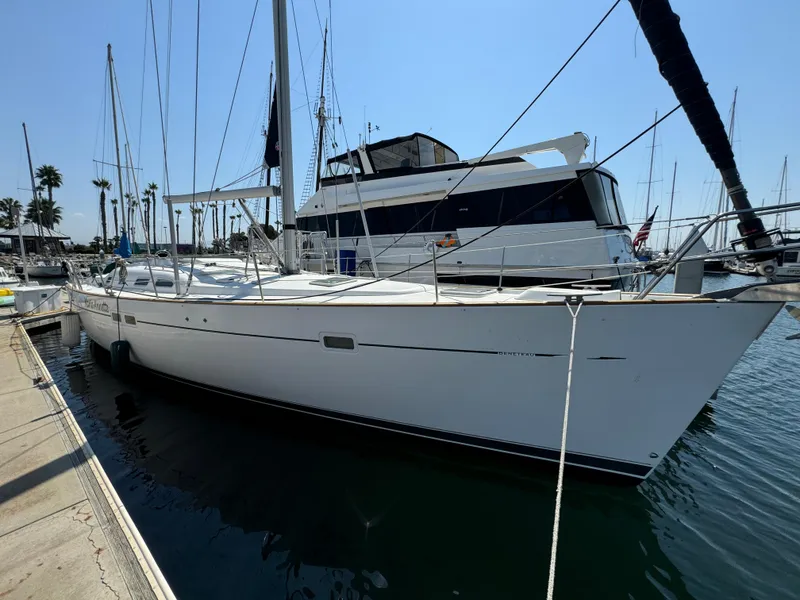 Slide: The Image of 2001 Beneteau Oceanis Clipper 473 sailboat docked in marina, side view. - 31