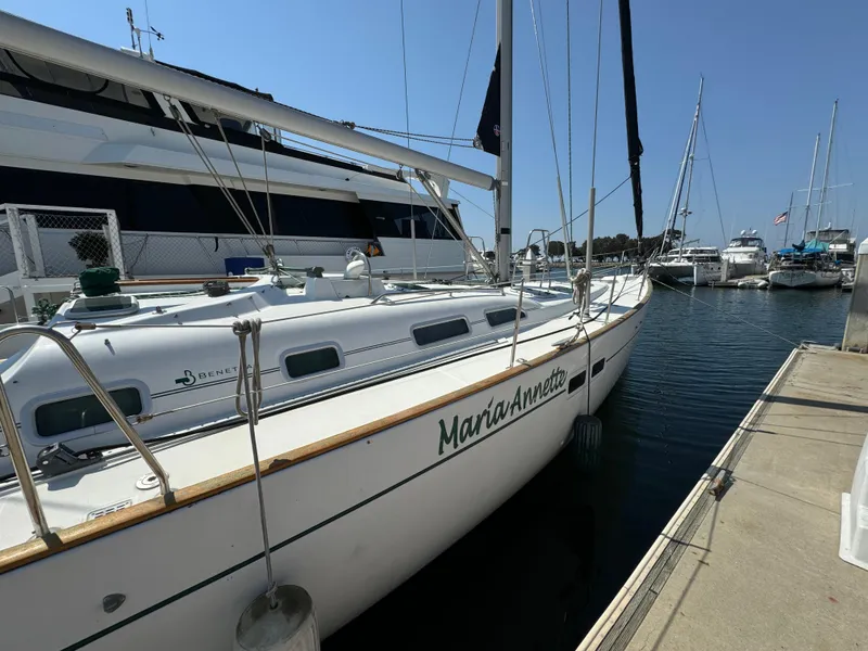 Slide: The Image of 2001 Beneteau Oceanis Clipper 473 sailboat docked in marina, sunny day. - 32