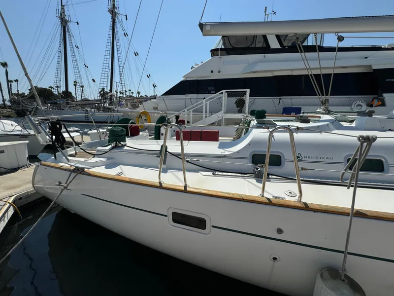 Slide: The Image of 2001 Beneteau Oceanis Clipper 473 sailboat docked at marina, side view. - 33