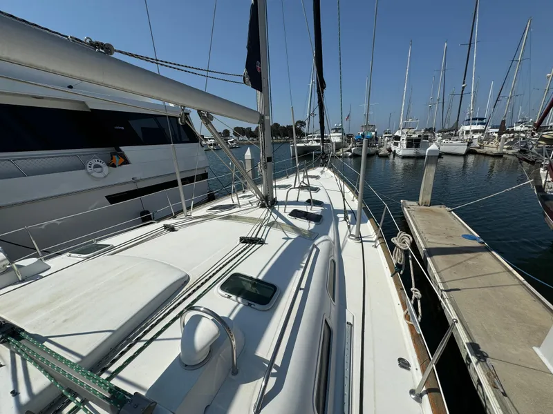 Slide: The Image of Beneteau Oceanis Clipper 473 sailboat docked at marina, 2001 model. - 9