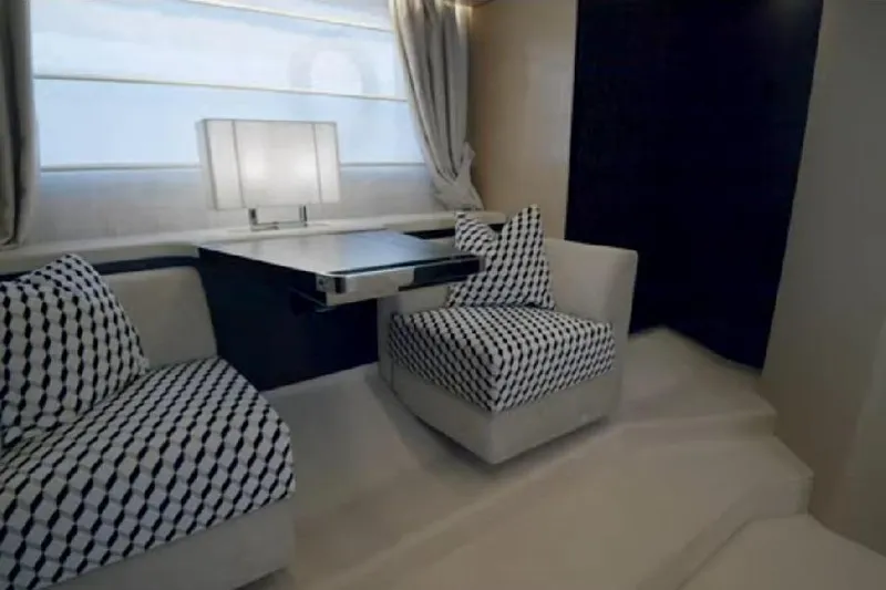 Slide: The Image of Luxurious interior of 2017 Azimut 66 yacht with modern seating and elegant decor. - 19