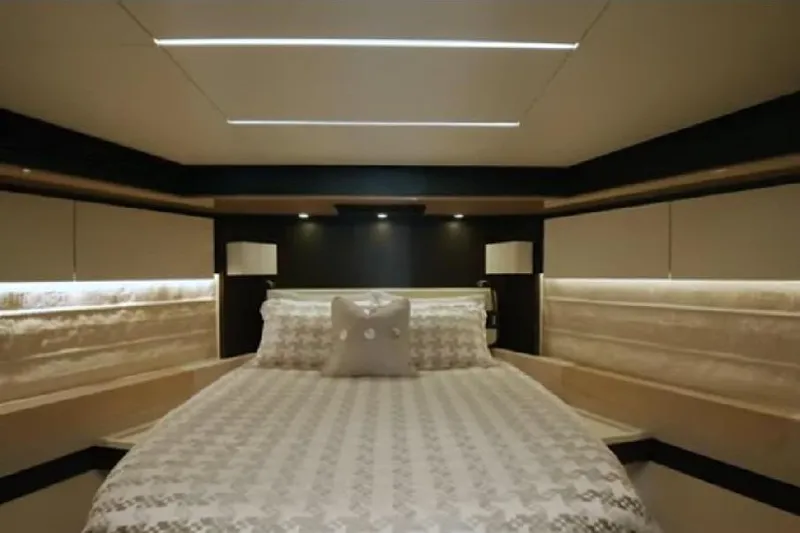 Slide: The Image of Luxurious bedroom interior of 2017 Azimut 66 yacht with elegant lighting and modern design. - 21