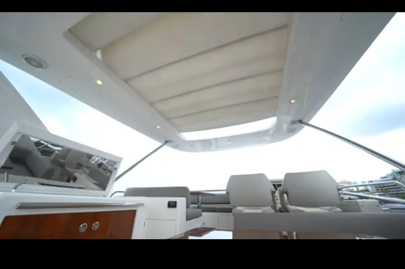 Slide: The Image of Luxurious interior of 2017 Azimut 66 yacht with modern seating and sleek design. - 27