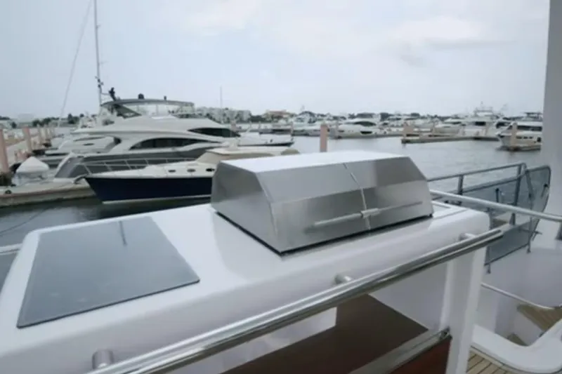 Slide: The Image of Luxury yacht Azimut 66 (2017) with outdoor grill at marina. - 31