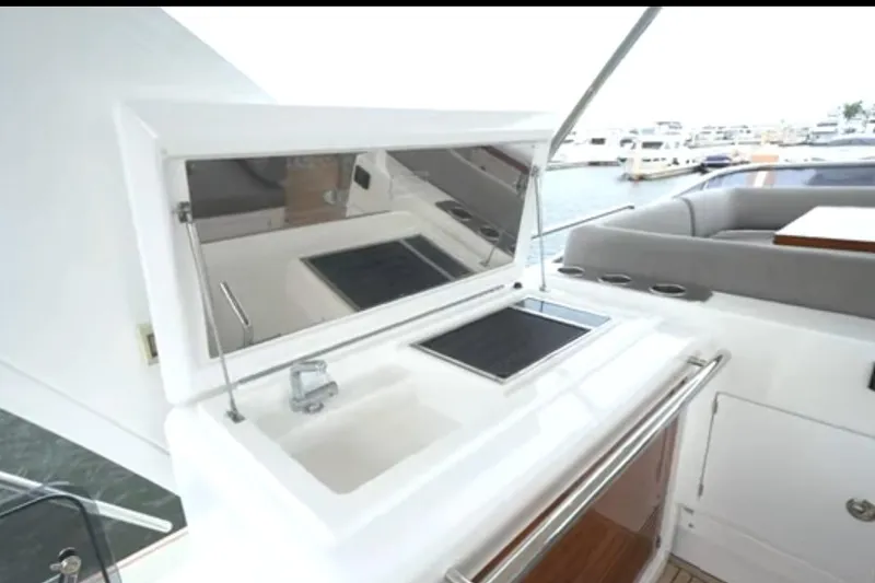 Slide: The Image of Luxury Azimut 66 yacht's outdoor kitchenette with sink and grill, 2017 model. - 32