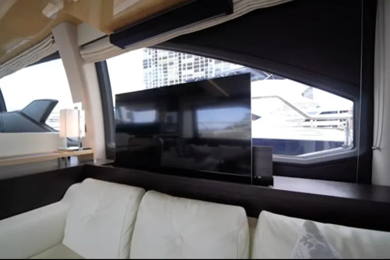 Slide: The Image of Luxurious interior of 2017 Azimut 66 yacht with modern TV and comfortable seating. - 7