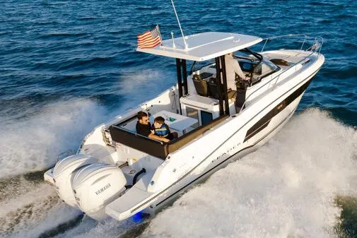 Slide: The Image of Manufacturer Provided Image: 2026 Jeanneau Leader 9.0 WA Series 2 cruising on ocean with passengers. - 2