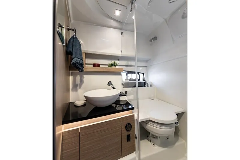 Slide: The Image of 2026 Jeanneau Leader 9.0 WA Series 2 boat with Yamaha engines, featuring sleek design and spacious deck. - 7