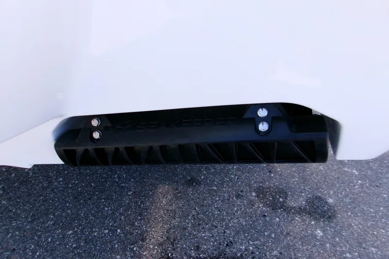 Slide: The Image of 2026 Sportsman Masters 267OE Bay Boat hull detail with Seakeeper component. - 6