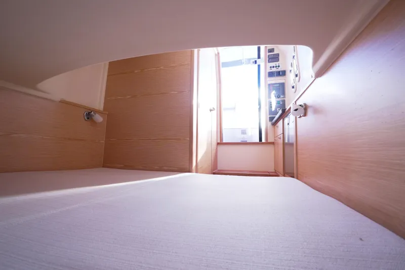 Slide: The Image of Interior cabin view of 2018 Fjord 36 Xpress, featuring wooden paneling and modern design. - 23