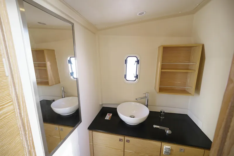 Slide: The Image of Modern bathroom interior of 2018 Fjord 36 Xpress yacht with sink and mirror. - 25