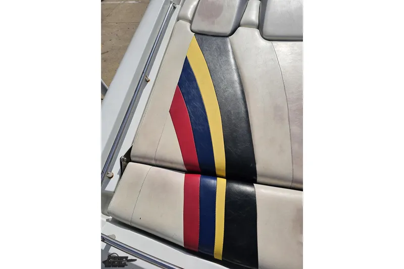 Slide: The Image of 2009 Formula 353 FASTech boat seat with colorful striped upholstery design. - 42