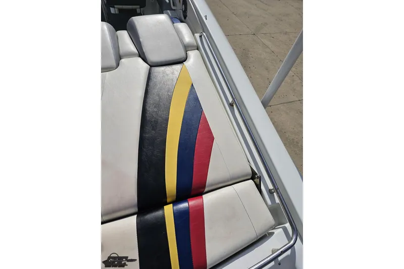 Slide: The Image of 2009 Formula 353 FASTech boat seat with colorful stripe design. - 43