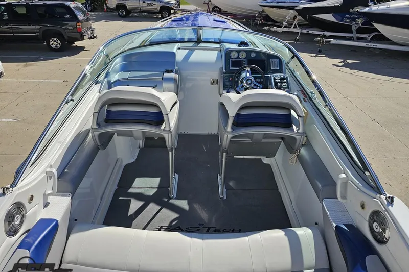 Slide: The Image of 2009 Formula 353 FASTech boat interior with dual seats and control panel. - 47