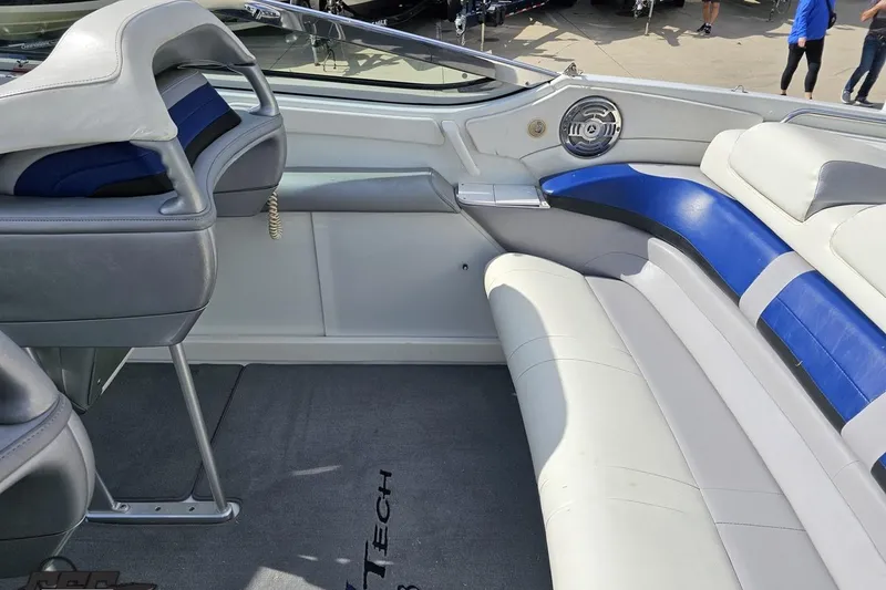 Slide: The Image of Interior of 2009 Formula 353 FASTech boat with blue and white seating. - 50