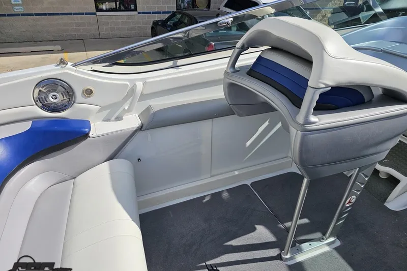 Slide: The Image of 2009 Formula 353 FASTech boat interior with blue and gray seating. - 54
