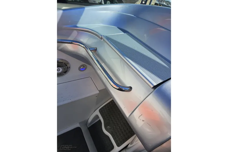 Slide: The Image of 2009 Formula 353 FASTech boat interior with chrome handle and speaker detail. - 57