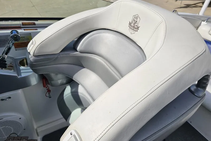 Slide: The Image of 2009 Formula 353 FASTech boat interior with white and gray seating. - 61