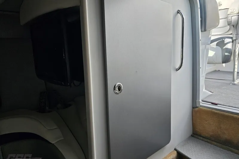 Slide: The Image of 2009 Formula 353 FASTech cabin interior with closed door and seating area. - 77