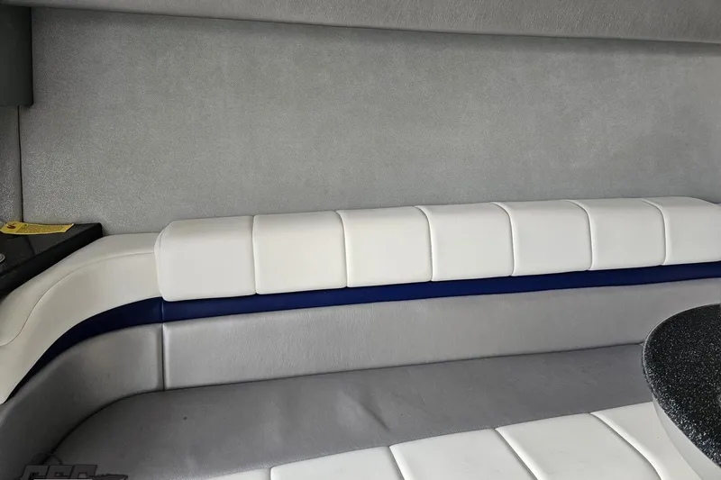 Slide: The Image of 2009 Formula 353 FASTech interior with white and blue cushioned seating. - 82