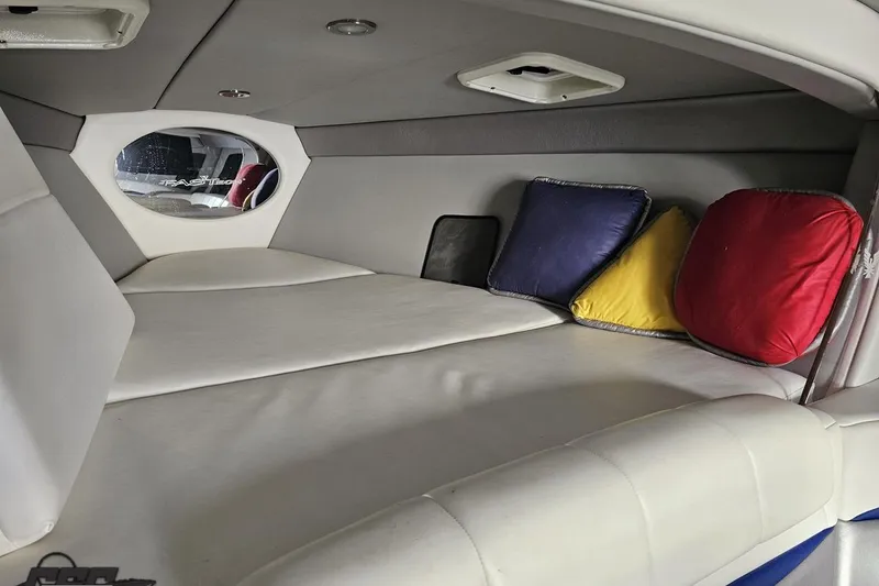 Slide: The Image of Interior cabin of 2009 Formula 353 FASTech boat with colorful cushions. - 86
