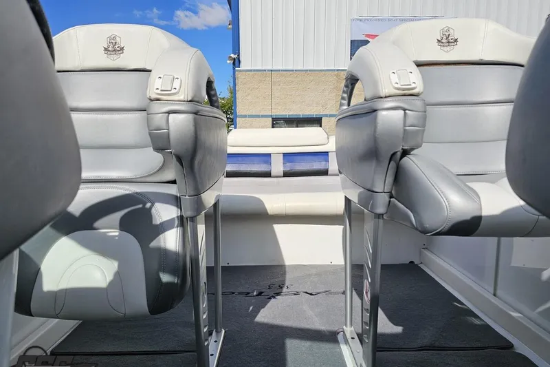 Slide: The Image of Interior of a 2009 Formula 353 FASTech boat with gray seating and logo. - 88
