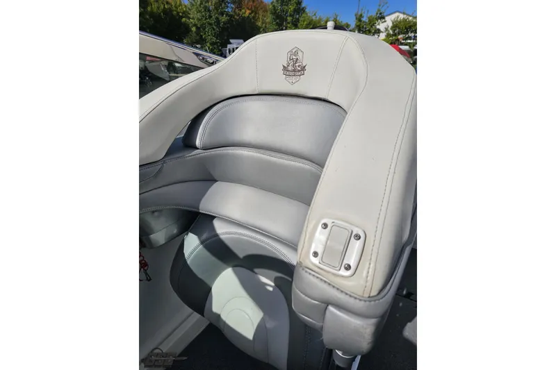 Slide: The Image of 2009 Formula 353 FASTech boat seat with embroidered logo and sleek design. - 89