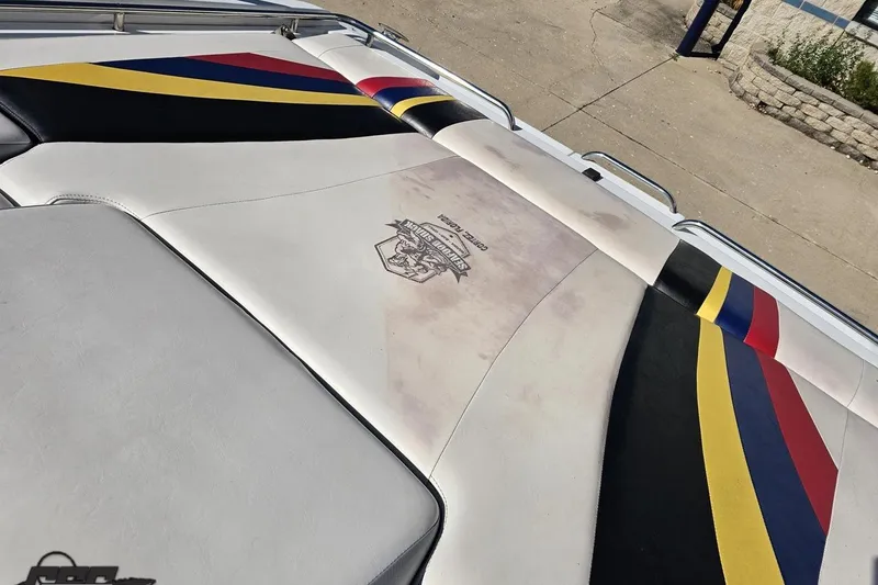 Slide: The Image of 2009 Formula 353 FASTech boat with colorful upholstery and logo detail. - 92